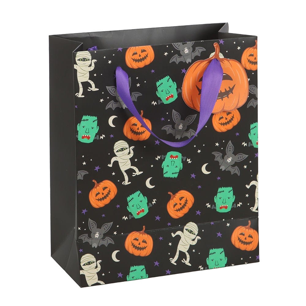 Angled view of Monster Mash Halloween gift bag with pumpkins, bats, mummies and monsters, ideal for trick or treating and spooky gifts