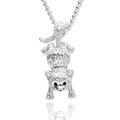 Silver cat pendant on a chain against a white background