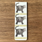 Alex Clark Little Treacle magnetic bookmark shown folded to demonstrate the secure magnetic design for marking book pages.