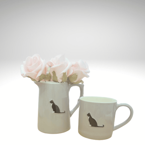 Bailey & Friends small grey tuxedo cat jug shown beside matching 250ml cat mug for size comparison