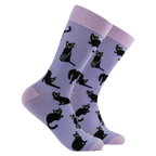 Socktopus Black Cats bamboo socks in lilac featuring playful black cats with pink cuffs, heels and toes on a soft lilac background.