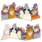 Emma Ball Cats in Hats two fold greetings card featuring five colourful cats wearing woolly hats and cosy clothing