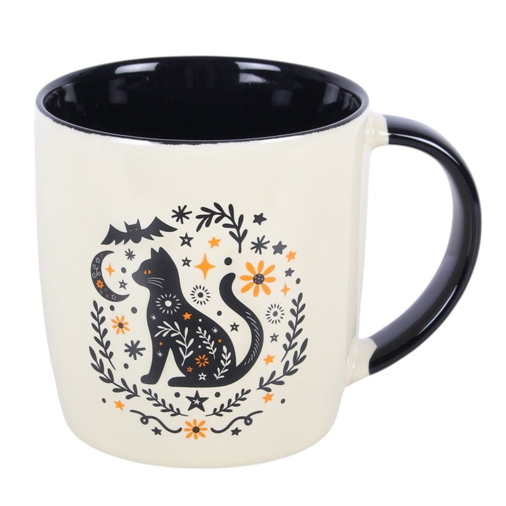 Rear view of cream ceramic black cat Halloween mug showing contrasting glossy black handle and interior