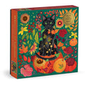 Galison Whiskers of Autumn 500 piece foil cat jigsaw puzzle box featuring a black cat with green eyes surrounded by sunflowers, autumn leaves and pumpkins.