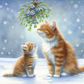 Ginger cats under the mistletoe Christmas card featuring a fluffy ginger cat and kitten together in the snow beneath festive mistletoe and falling snowflakes