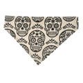 Handmade white cotton over-the-collar bandana for cats and dogs featuring detailed black sugar skulls with flowers, hearts and swirls