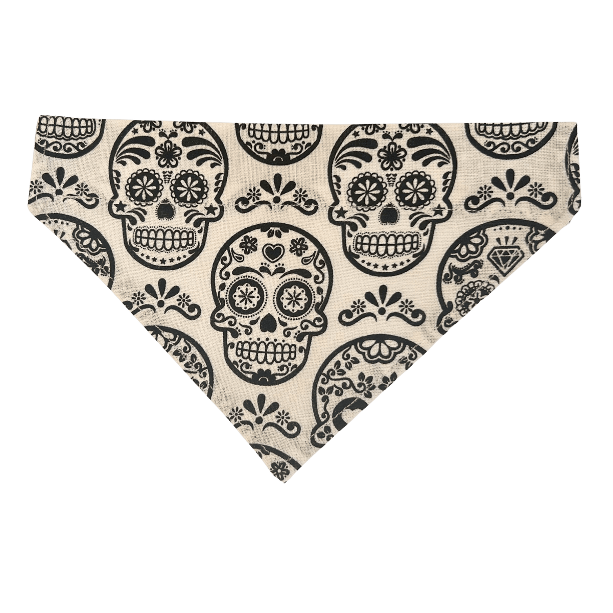 Handmade white cotton over-the-collar bandana for cats and dogs featuring detailed black sugar skulls with flowers, hearts and swirls
