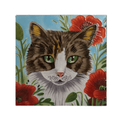 Hand-painted Poppy Patch Prowl ceramic tile by J Yates, featuring a fluffy brown and white tabby cat with bright green eyes among red poppies and green foliage.