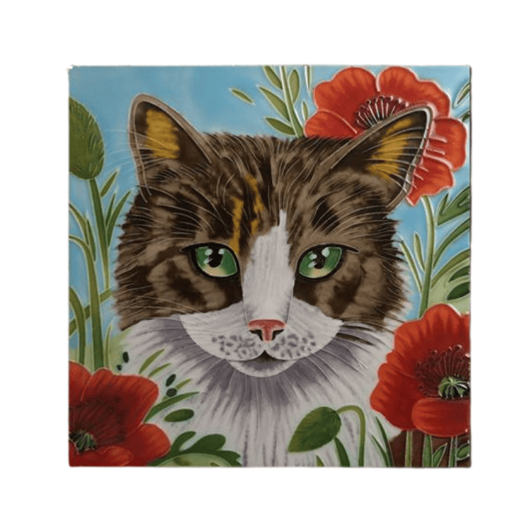 Hand-painted Poppy Patch Prowl ceramic tile by J Yates, featuring a fluffy brown and white tabby cat with bright green eyes among red poppies and green foliage.