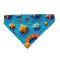 Handmade Blue Sky over the collar bandana for cats and dogs, featuring 3D-effect smiling yellow stars, fluffy clouds and colourful rainbows on bright blue cotton fabric.