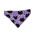 Handmade cotton lilac Halloween over-the-collar bandana with cute black cat faces for cats and dogs.