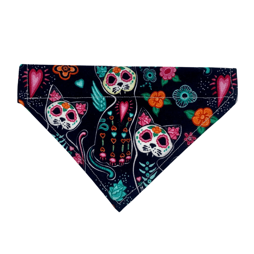 Handmade over-the-collar cat and dog bandana featuring colourful sugar skull cats, flowers and hearts on a dark background
