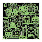 Glow-in-the-dark Haunted House Cats puzzle effect revealing luminous green costumed cats, cobwebs, moon and Halloween details