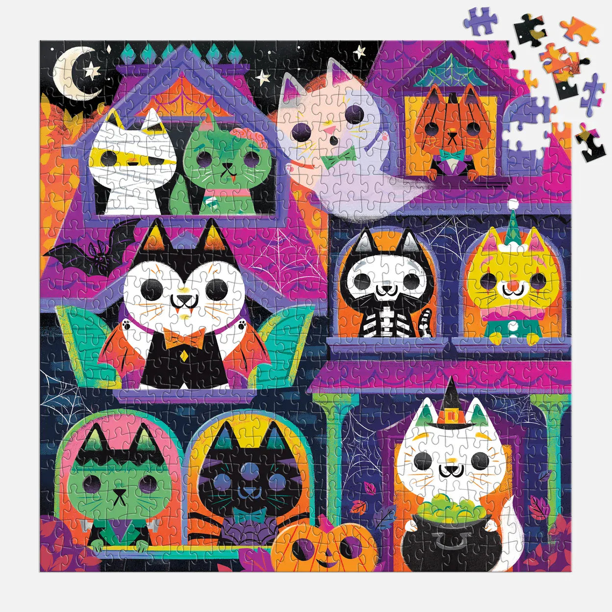 Mudpuppy 300-piece Haunted House Cats puzzle partially completed with colourful loose jigsaw pieces beside the haunted house scene