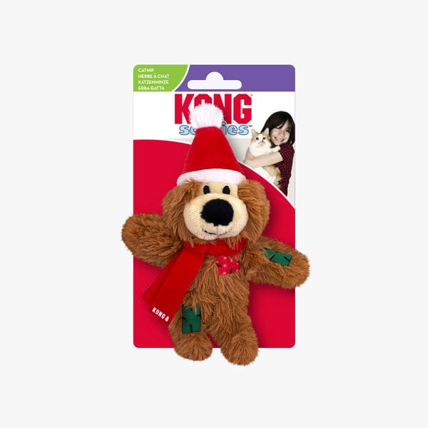 Brown KONG Softies Winter Bear catnip cat toy displayed on original KONG seasonal packaging, wearing a red Santa hat and scarf.

