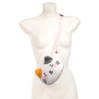Cross body view of Adoramals Lola the Cat crossbody bag on mannequin