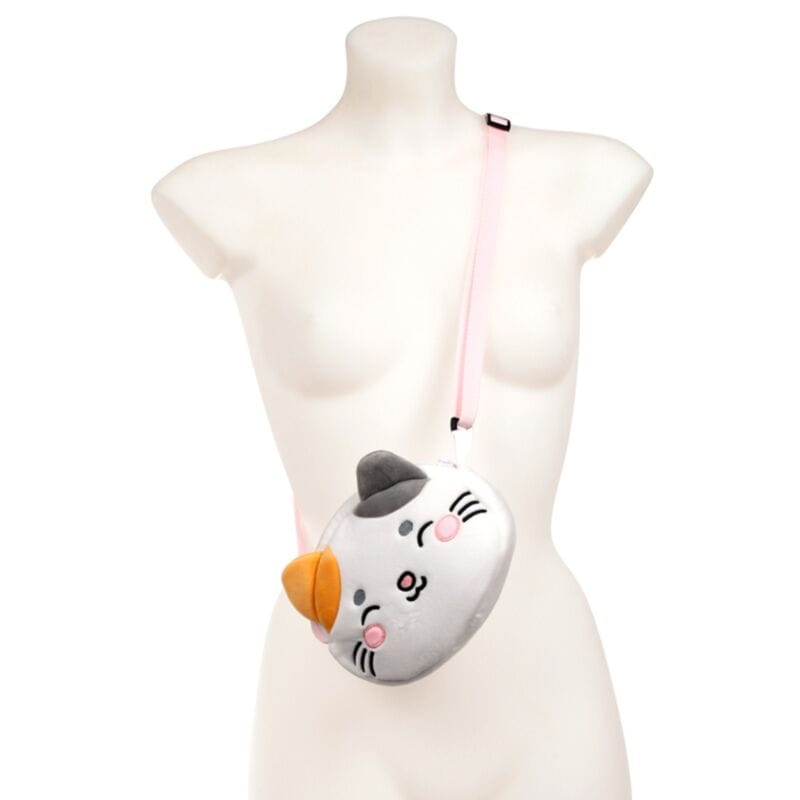 Cross body view of Adoramals Lola the Cat crossbody bag on mannequin