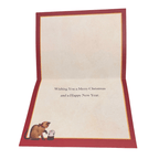Inside Lowell Herrero Buddy Mayote Christmas card with red and gold border, festive cat illustration and printed greeting