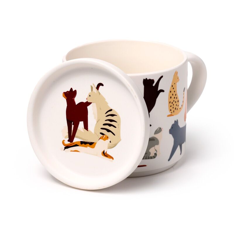 Ceramic mug with animal illustrations on a white background