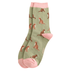 Miss Sparrow Tabby Cats bamboo socks in olive green displayed together with pink cuffs, heels and toes