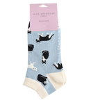Packaged Miss Sparrow Ladies Black & White Cat bamboo trainer socks in powder blue featuring playful black and white cats with cream cuffs, heels and toes.
