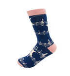 Side view of Miss Sparrow Ladies Bamboo Socks in navy with cream musical cats, music notes and contrasting soft pink cuff, heel and toe.