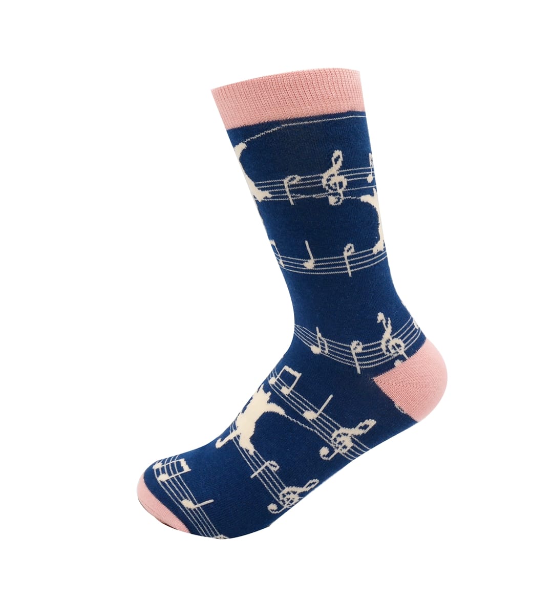 Side view of Miss Sparrow Ladies Bamboo Socks in navy with cream musical cats, music notes and contrasting soft pink cuff, heel and toe.