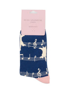 Miss Sparrow Ladies Bamboo Socks in navy featuring cream cat silhouettes walking across musical staves with notes, displayed in branded gift packaging.