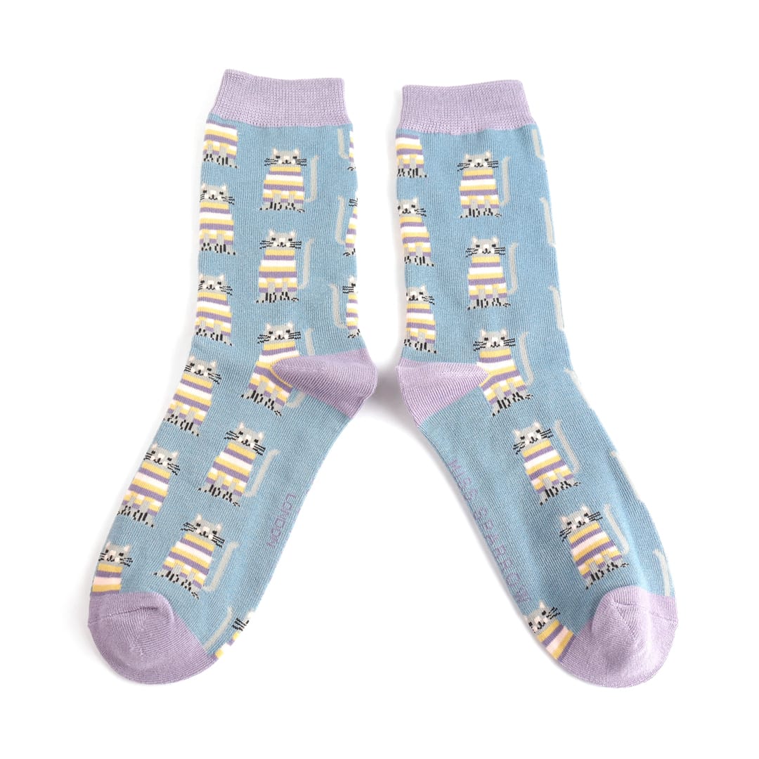 Pair of Miss Sparrow Ladies Bamboo Cat Socks 'Cosy Kitties' in denim blue, featuring adorable pastel striped cats with soft lavender heels, toes and cuffs on a denim blue background.
