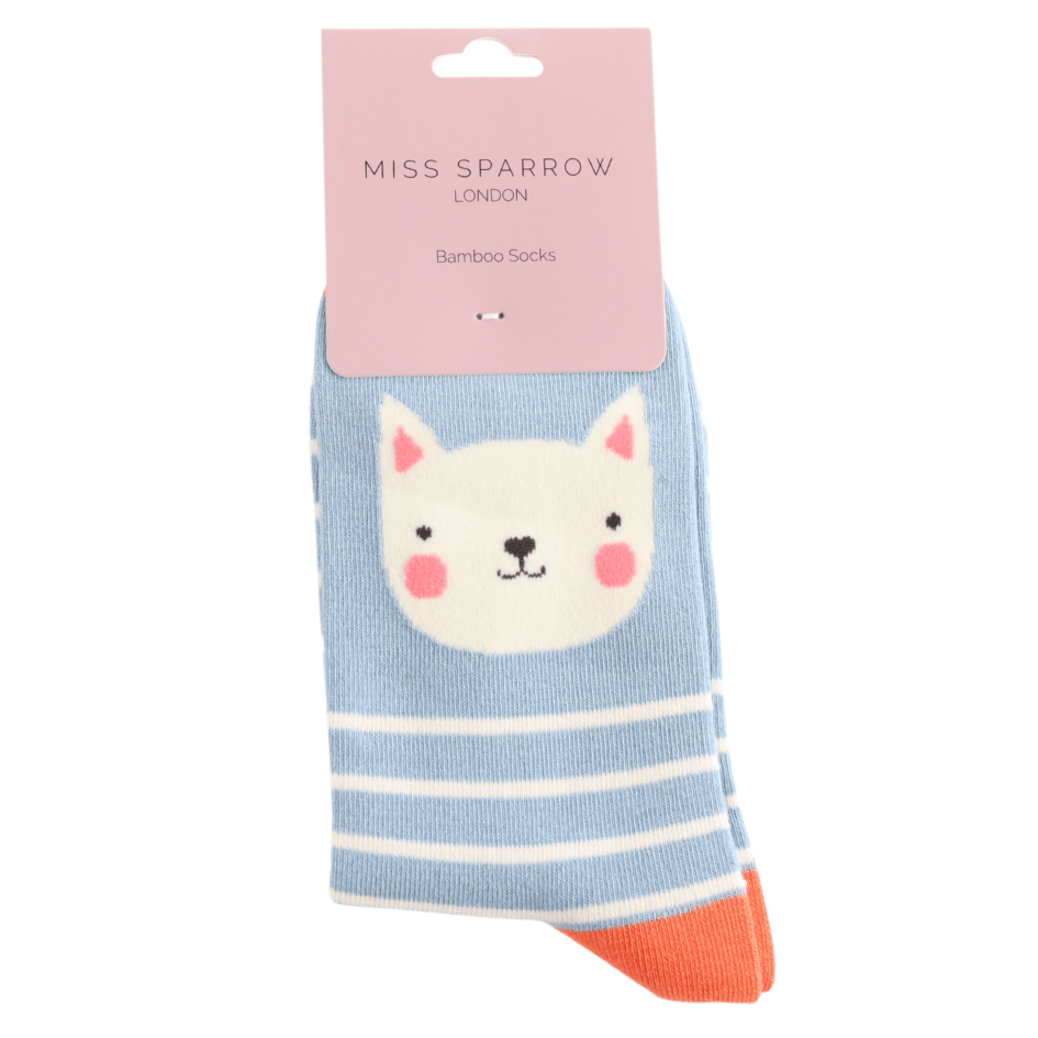 Miss Sparrow Ladies Bamboo Cat Socks 'Kitty Stripes' in powder blue, shown in branded packaging with a smiling white kitty face, white stripes and bright coral orange toe detail.