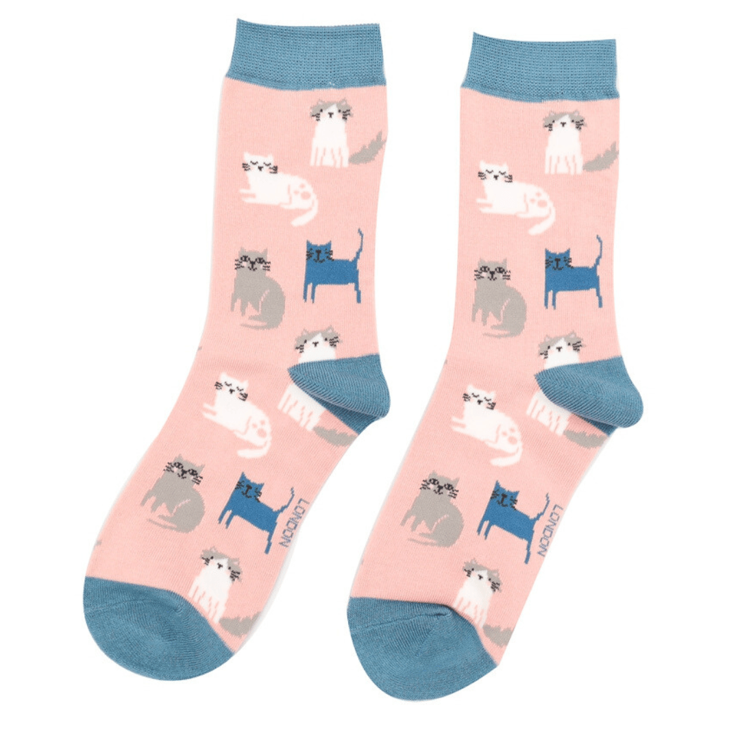 Miss Sparrow ladies' dusky pink bamboo socks featuring white, grey and navy kitten designs with contrasting blue cuffs, heels and toes.
