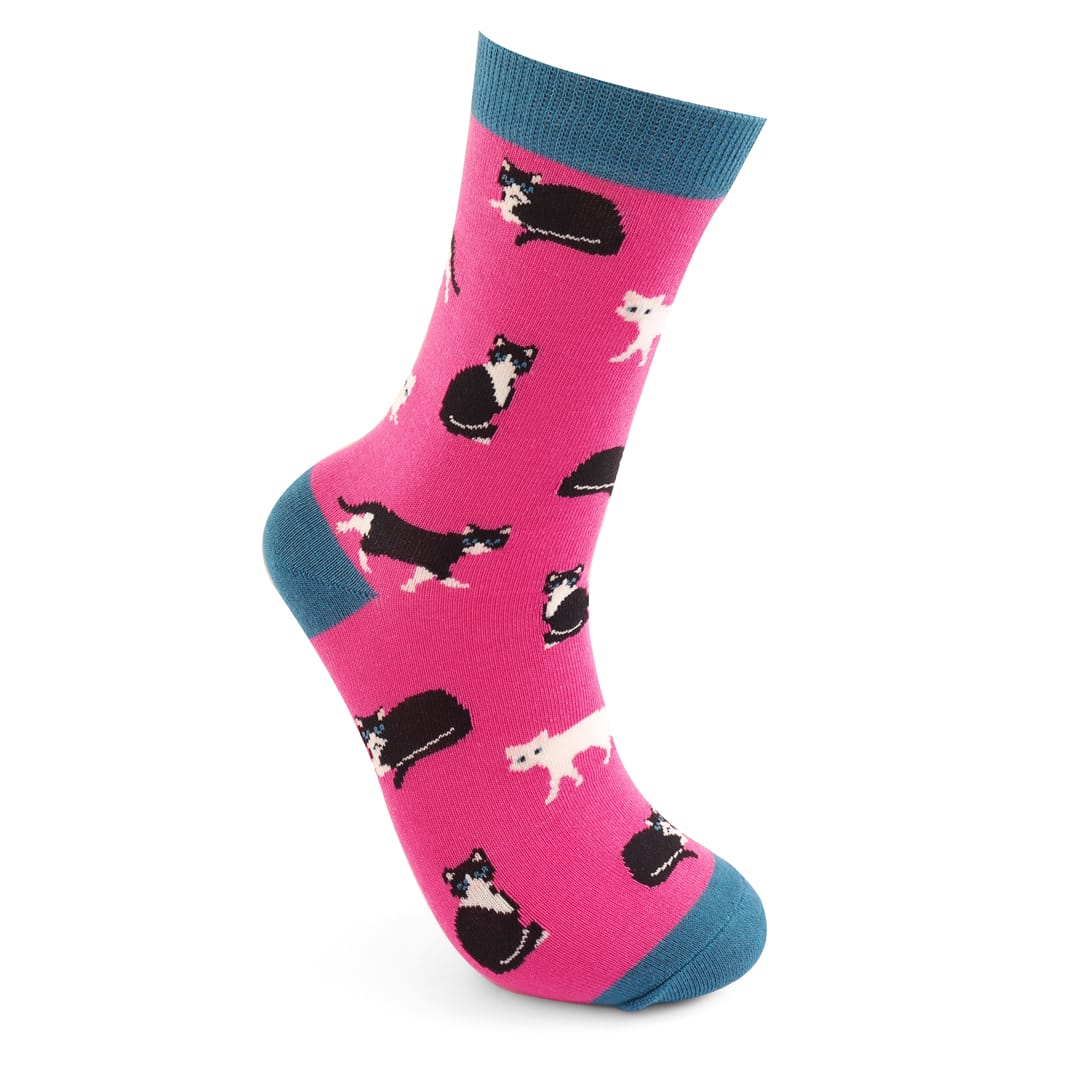 Side view of Miss Sparrow Ladies Bamboo Socks in bright fuchsia pink with playful black and white cat silhouettes and contrasting teal heels, toes and cuffs, made from a soft bamboo-rich fabric.