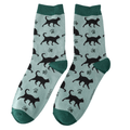 Pair of Miss Sparrow Ladies Bamboo Cat Socks featuring striking black cat silhouettes and delicate paw prints across a soft aqua background, finished with rich teal heels, toes and cuffs.