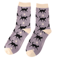 Pair of Miss Sparrow Ladies Bamboo Cat Socks featuring striking black cat silhouettes and cream paw prints across a soft mauve background with matching cream heels, toes and cuffs.