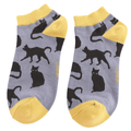 Pair of Miss Sparrow ladies' cornflower blue bamboo trainer socks featuring playful black cat silhouettes with contrasting mustard yellow cuffs, heels and toes.