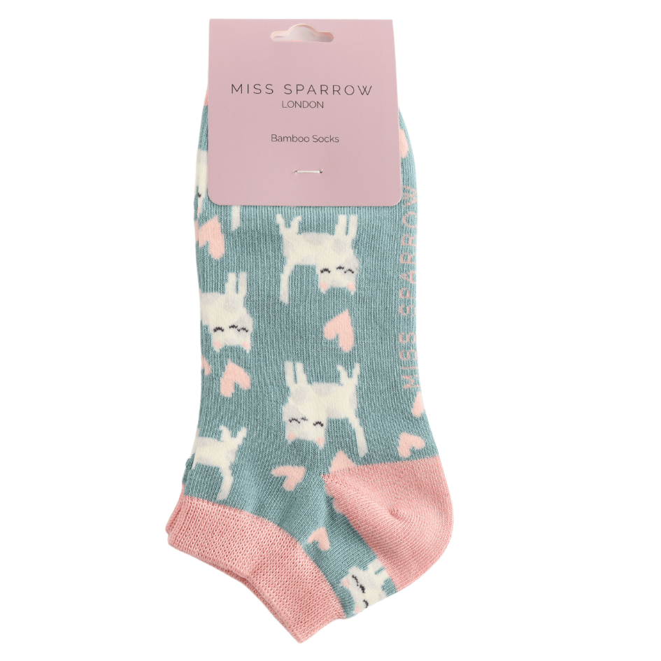 Packaged Miss Sparrow Ladies Sleepy Cats bamboo trainer socks in duck egg with sleepy white cats, pink hearts and soft pink trim.