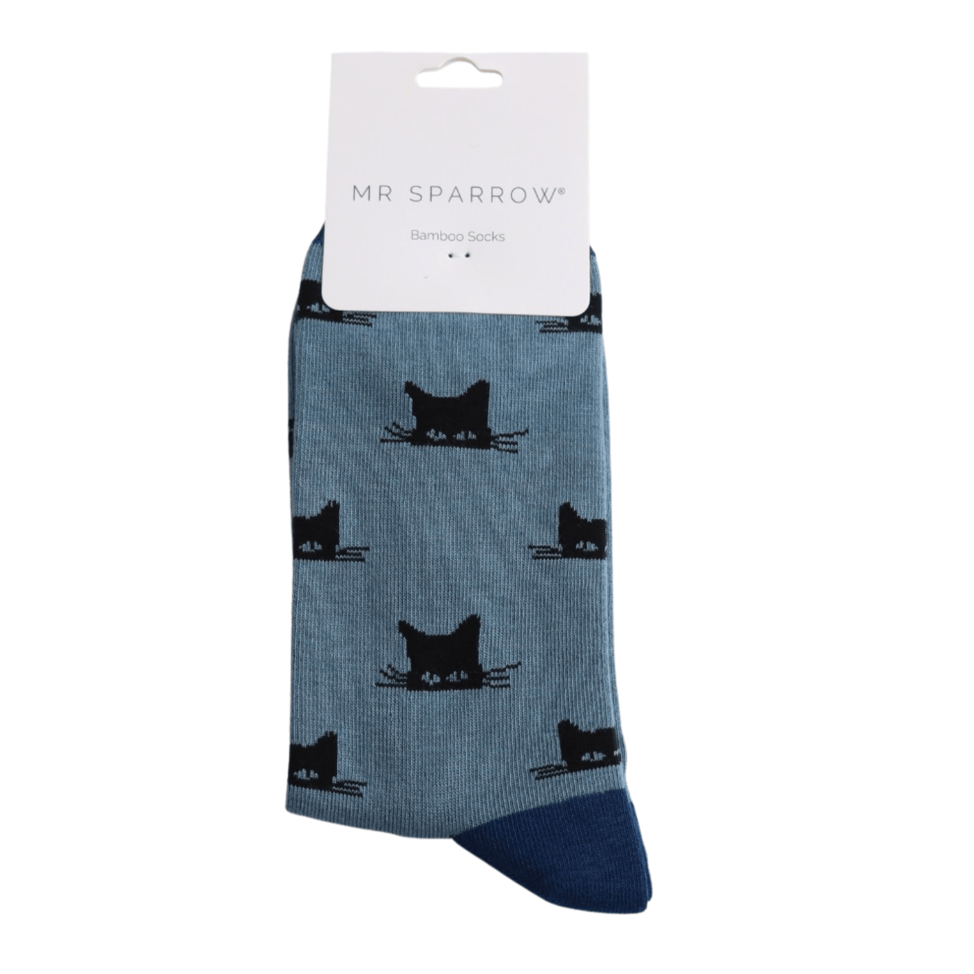 Packaged Mr Sparrow men's bamboo socks with a black peeking cat pattern on a denim blue background and navy heel and toe.