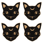 Set of four Mystic Mog black cat face MDF coasters with celestial moon and star design.