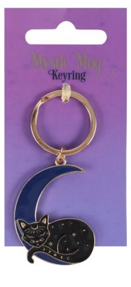 Mystic Mog metal and enamel keyring featuring a celestial black cat sleeping in the moon.
