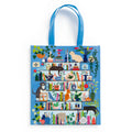 Galison Purrfect Nook reusable shopping bag with blue handles and a colourful bookcase design featuring cats, books, plants and decorative ornaments