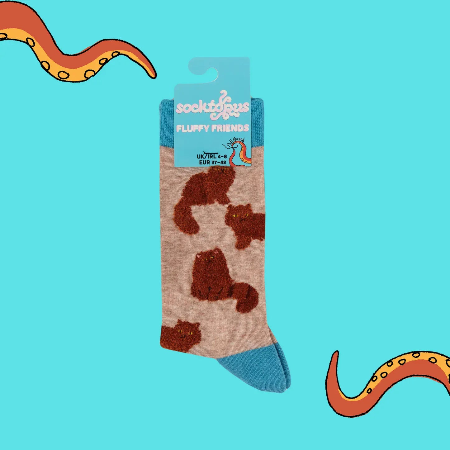 Socktopus Fluffy Friends cat socks in retail packaging, showing the fluffy ginger cat design and soft textured finish.
