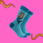 Angled view of Socktopus Sparkly Cat Mermaid cotton socks highlighting the shimmering glitter-effect mermaid tail and bright aqua design.