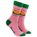 Pair of Socktopus Ladies It's Too Peopley Outside cat socks showing a ginger cat curled up on a green cushion, blue slogan lettering, pink fabric and contrasting green cuffs, heels and toes.