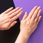 Halloween nail stickers applied to fingernails with spooky designs