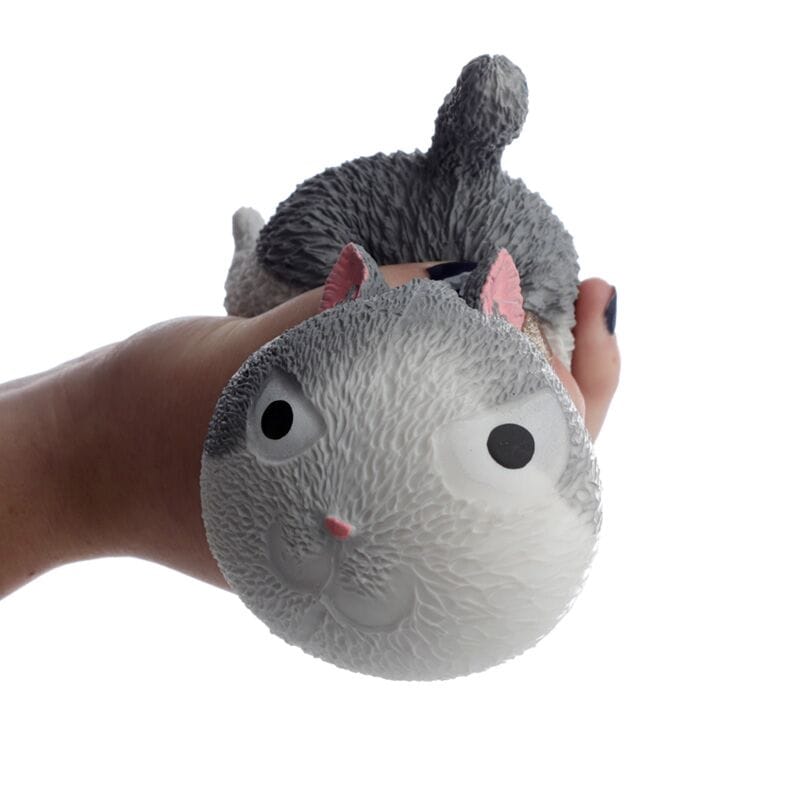Grey and white Squeezy Stretchy Cat Stress Reliever Toy being squeezed by hand