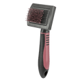 Pink and black Trixie cat grooming brush with soft rounded bristles and a comfortable easy-grip handle for gentle feline pampering
