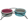 Trixie elevated cat feeding set with turquoise and pink ceramic bowls held in a black powder-coated metal stand