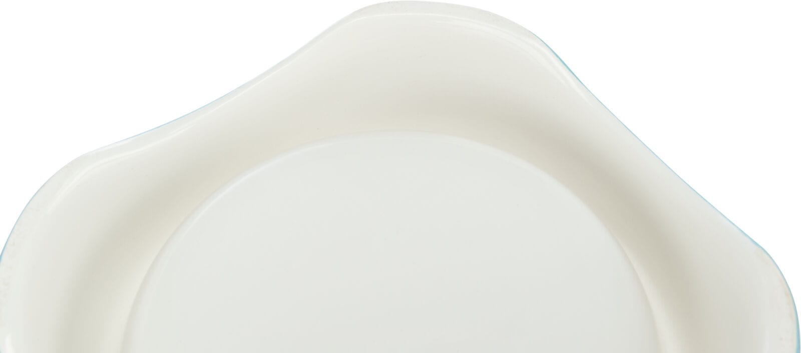 Base of Trixie ceramic cat food and water bowl with CAT lettering and fishbone design inside
