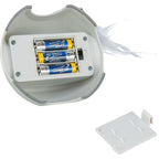 Battery compartment of the Trixie Catch Me Motorised Cat Toy showing space for three AA batteries and feather attachment.