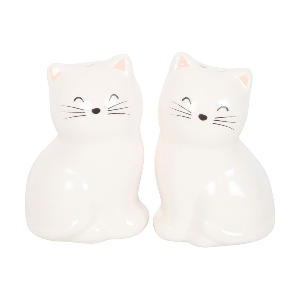 White ceramic cat salt and pepper shakers featuring two adorable smiling cats with pink ears, black whiskers and glossy finish, sitting side by side.
